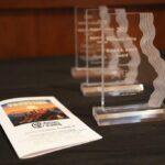 Partners in Giving awards and program sit on a tabletop