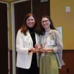 Zoe Hayes receives her award from Kathy Blumenfeld